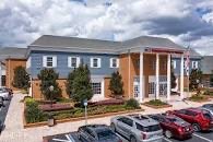 Longwood FL counseling office exterior at 1855 West SR 434, Suite 216, where Cynthia Benedict holds in-person sessions