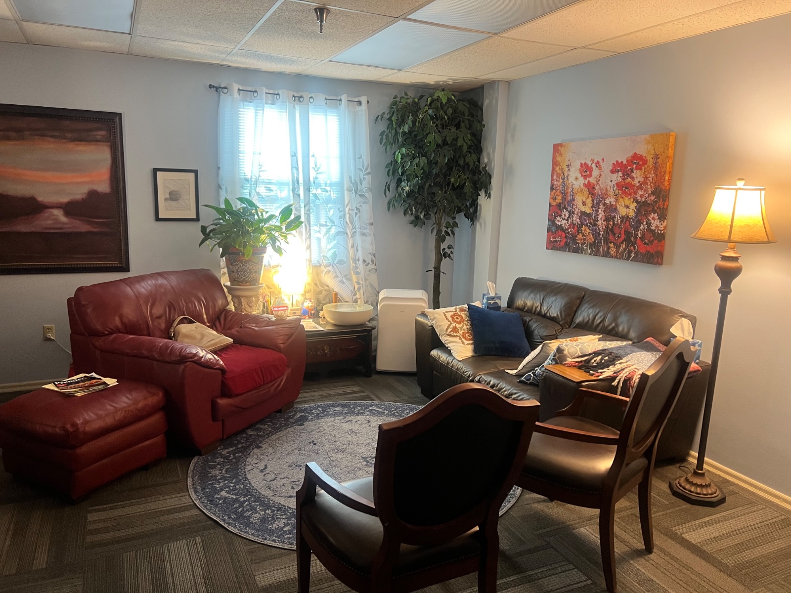 Cynthia Benedict, licensed counselor and certified life coach, smiling warmly in her Longwood FL counseling office